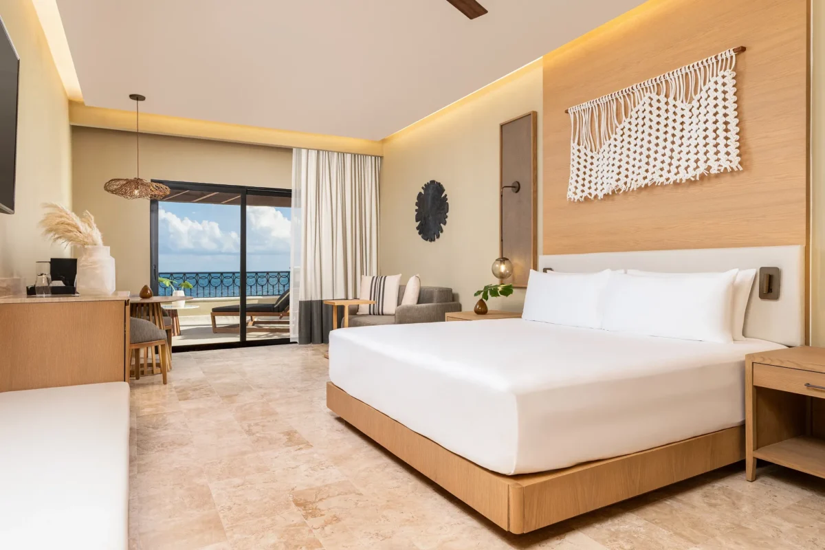 Club Level Master Suite Oceanfront King bedroom with balcony and ocean view at Hyatt Zilara Riviera Maya.