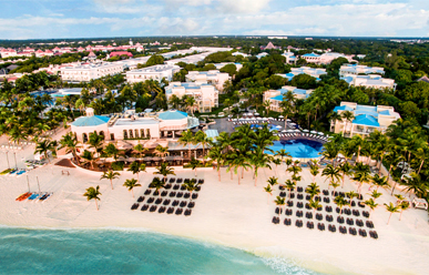 Royal Hideaway Playacar adults-only luxury all-inclusive resort with colonial-style architecture, lush gardens, and white sand beach in Playa del Carmen.