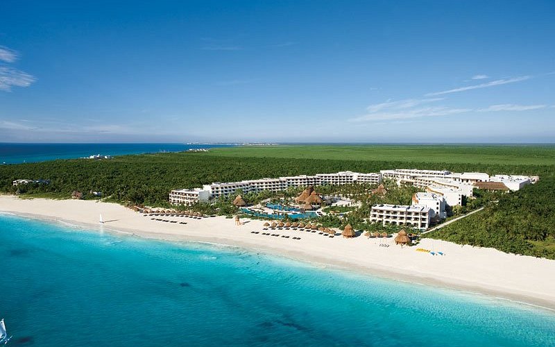 Secrets Maroma Beach Riviera Cancun adults-only all-inclusive resort on famous Maroma Beach with luxury suites and turquoise waters.